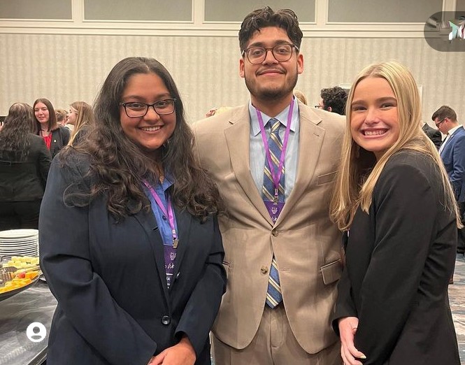 Students from TCNJ's Pi Sigma Epsilon chapter.