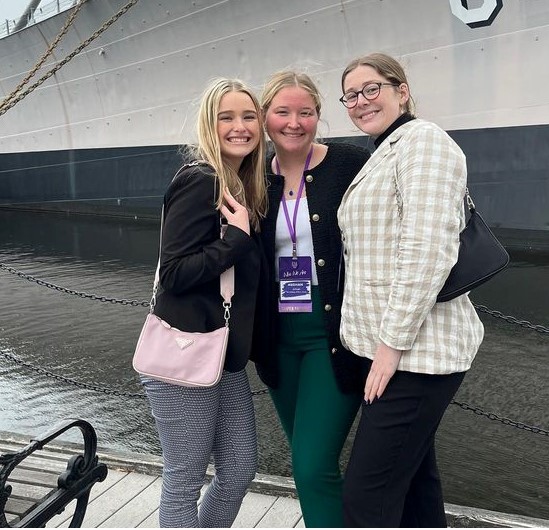 Students from TCNJ's Pi Sigma Epsilon chapter.